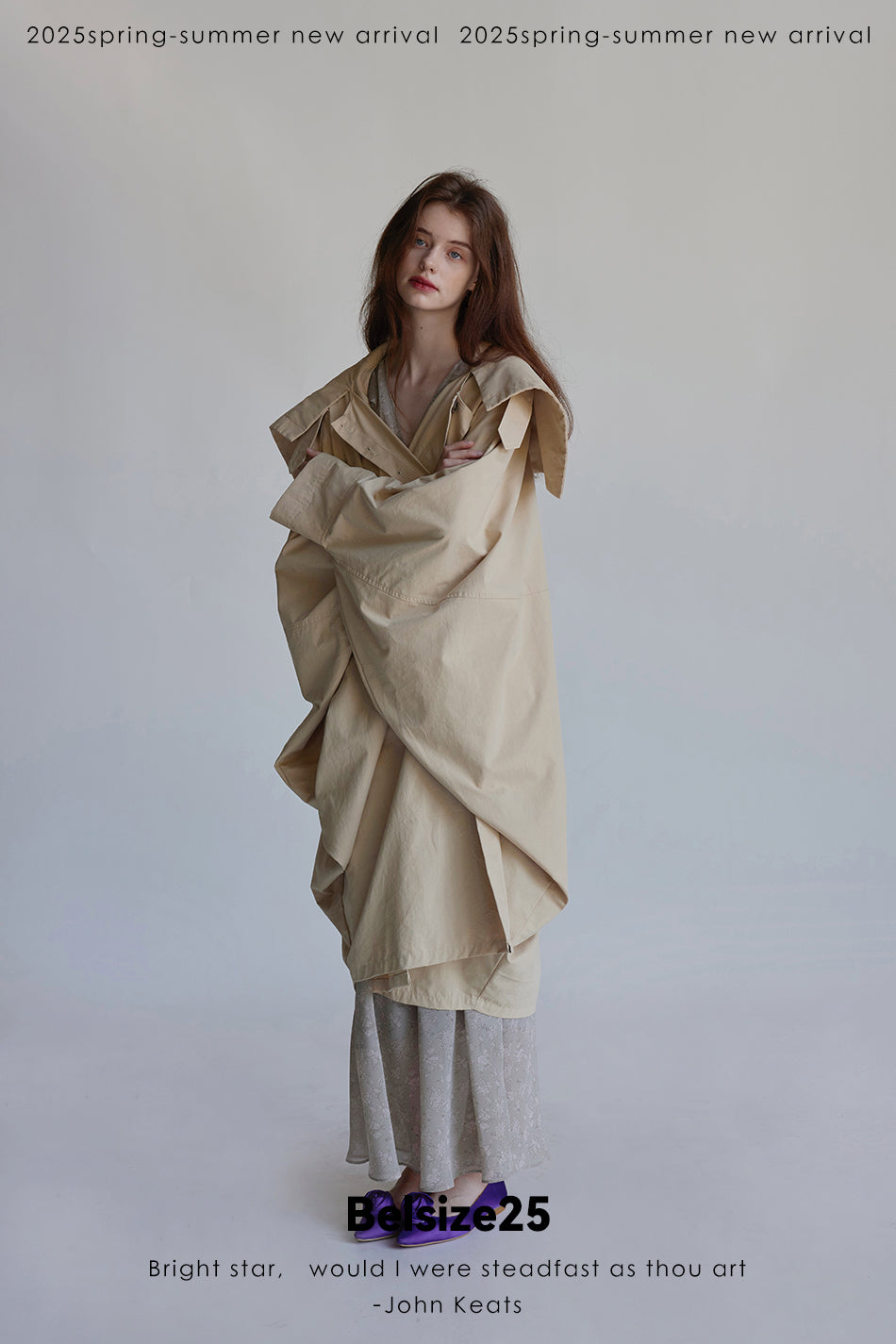Wing coat Oversized, cocoon-shaped trench coat
