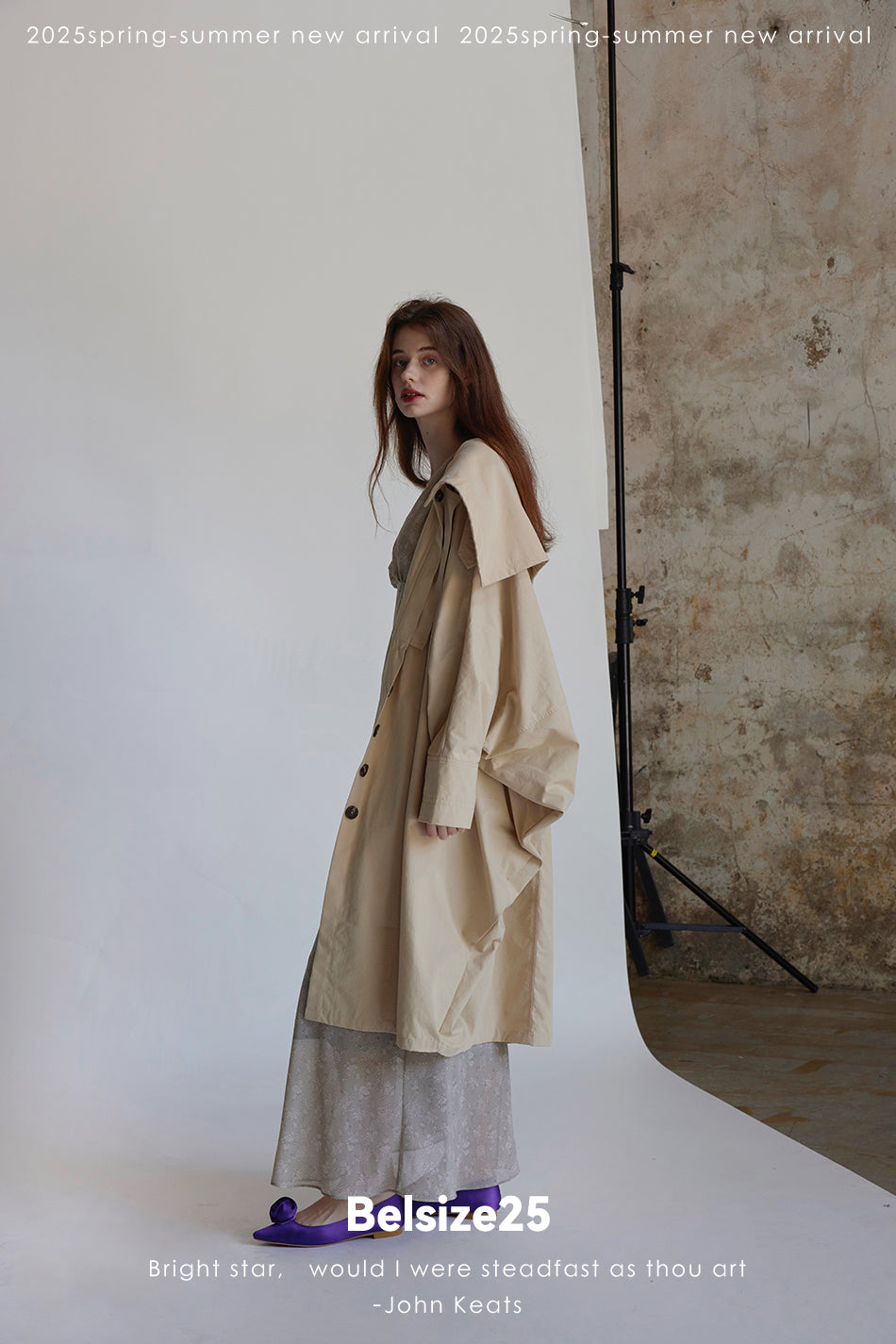 Wing coat Oversized, cocoon-shaped trench coat