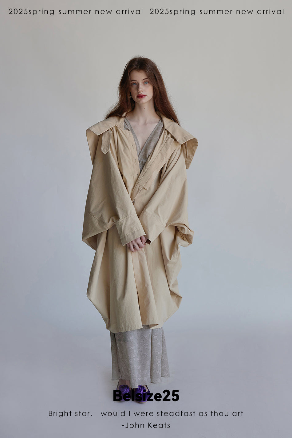 Wing coat Oversized, cocoon-shaped trench coat