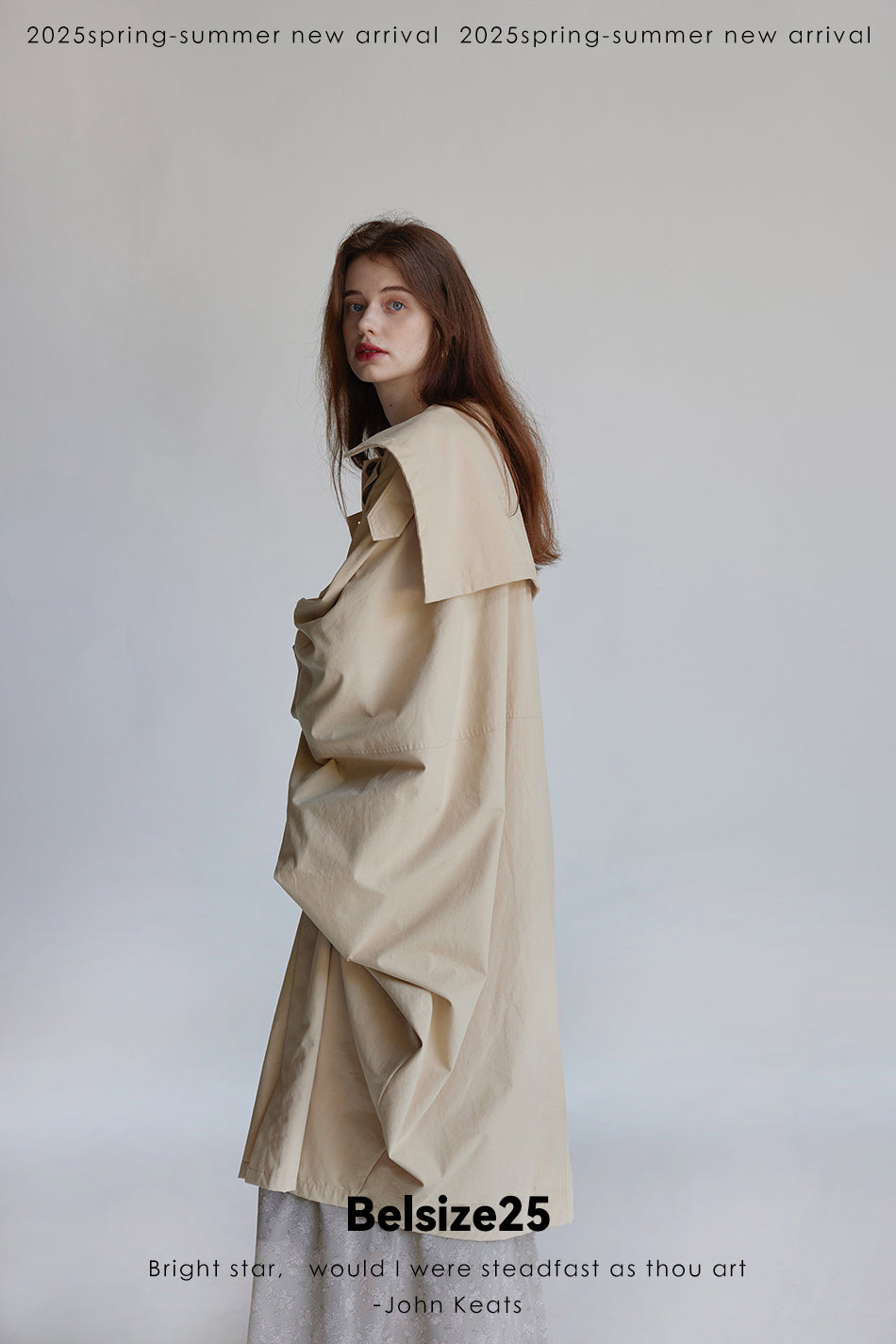 Wing coat Oversized, cocoon-shaped trench coat