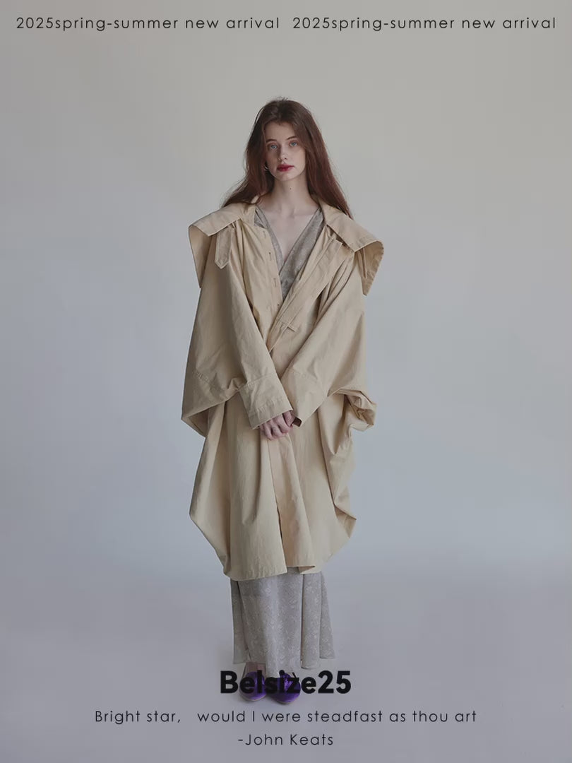 Wing coat Oversized, cocoon-shaped trench coat